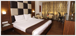 25 Centrally Air-Conditioned Deluxe / Super Deluxe / Executive Rooms with Exceptional Architectural Decor. 